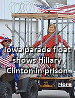 Arcadia, Iowa parade float depicting Hillary Clinton in prison while being hit with water balloons stirs controversy.
